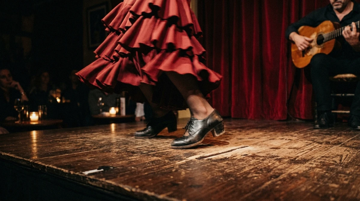 Dancer's feet and skirt on the wooden boards of a tablao during a flamenco show in Barcelona, Spain